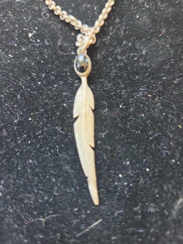 Marked sterling feather with - sterling,