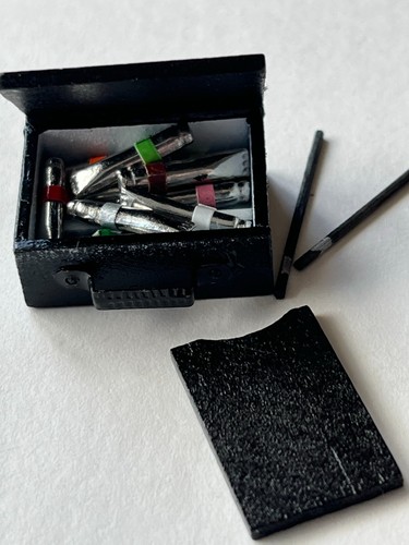 Artists opening painting box - artists,