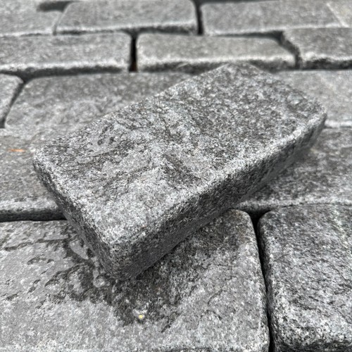 Black tumbled granite cobble - tumbled,