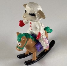 LAMB CHOP ON ROCKING HORSE 3
