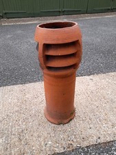 red / terracotta colour victorian chimney pot , believed to be  clay