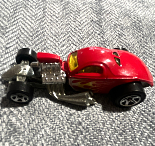 Red diecast hot - rod, with
