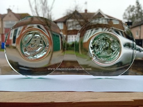 Two pontil roundels for - two,