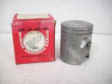 NEW Genuine Piston / Piston