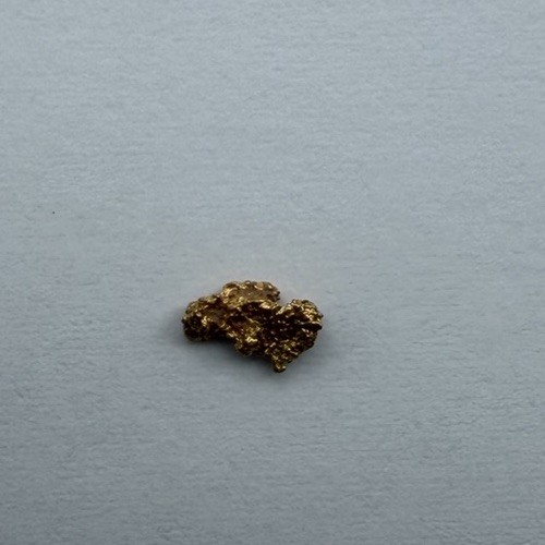 Gold coloured bullion nugget - gold-coloured,