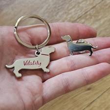 Vitality Sausage Dog Keyring Puppy Pin Badge Dachshund Pink Collar Writing TV Ad