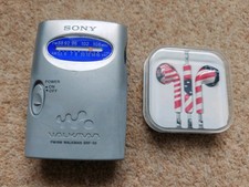 Sony AM FM Walkman Radio  headphones SRF-59