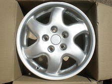 NEW BOXED ALLOY WHEELS FOR RENAULT SAFRANE OR LAGUNA.