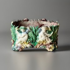 Antique Majolica Footed Planter Cache Pot With Putti Cherubs Bulrushes Design