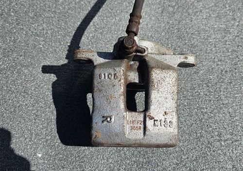 Mazda brake caliper front - mazda,