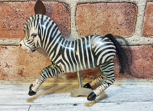 Vintage jumping zebra tin - zebra,