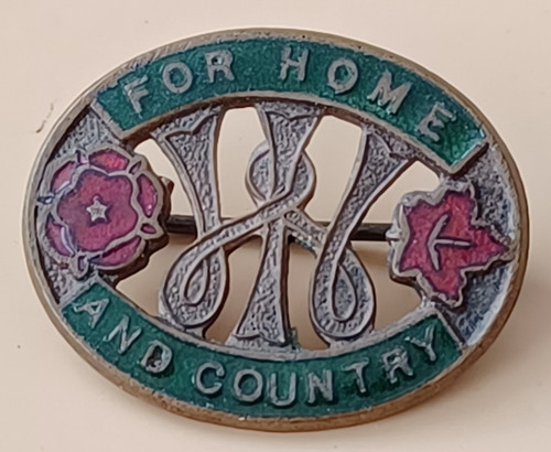 Home and country badge woman - home,