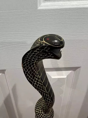 Wooden walking stick hand