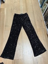 Black sequin trousers