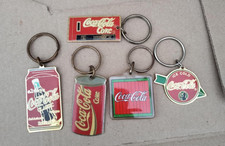 5 x vintage Coca-Cola key rings 4 metal  1 plastic