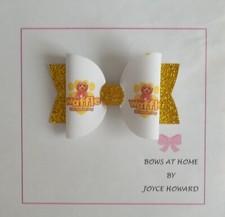 HANDMADE  HAIR BOWS - GLITTER AND FAUX LEATHER - WAFFLE THE WONDER DOG