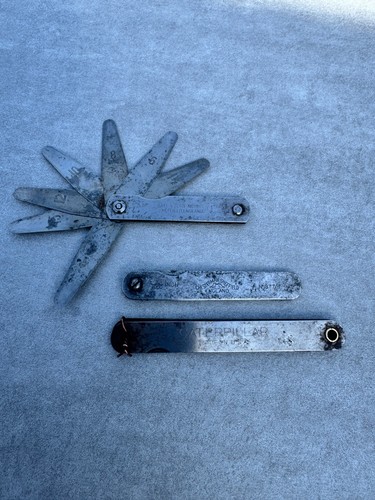 Three vintage feeler gauges