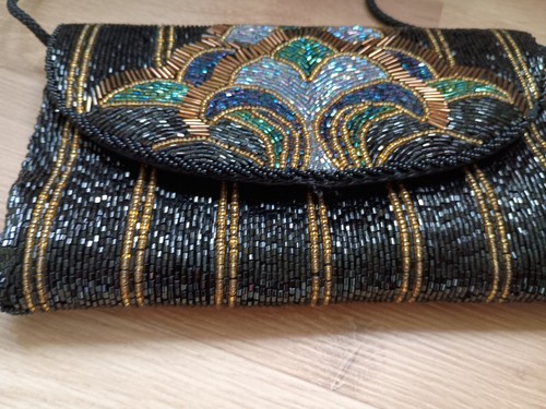 Heavily sequinned - heavily,