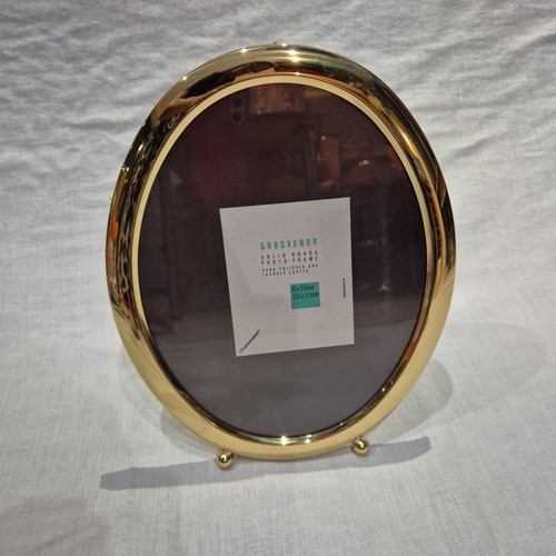 Grosvenor oval brass photo - brass,