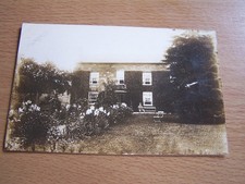 Man Outside Unknown House