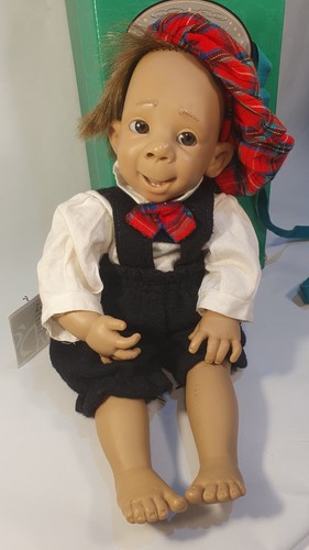 Hard plastic spanish doll - plastic,