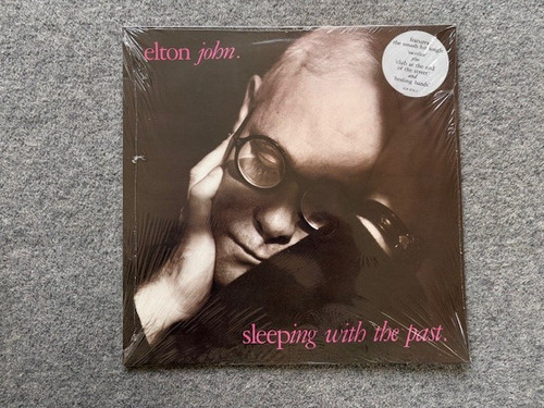 Elton john sleeping with the - john,