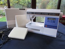 A GOOD WORKING HUSQVARNA 350 COMPUTER SEWING MACHINE WITH CASE,FEET & PEDAL