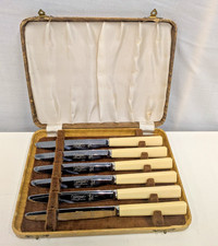 A Set Of 6 Leclere Faux Bone