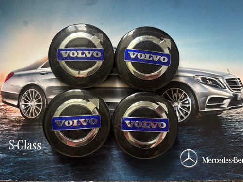 Four genuine volvo - genuine, caps