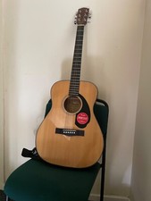 Guitar acoustic with leathergrafted webbing strap with clip tuner  and bag 