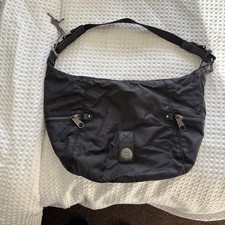 Kipling Cathryn black shoulder bag, metal monkey, leather trim