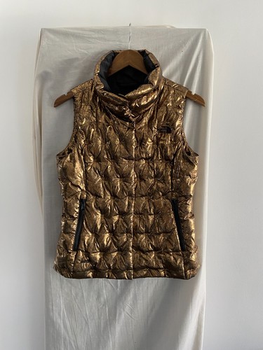 The north face - face, gold