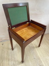Victorian or Edwardian antique Mahogany piano stool with storage seat