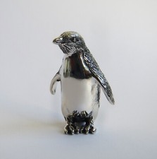 Penguin standing figurine