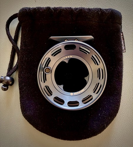 Backwinder trout fly - fly, reel