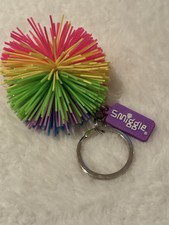 Novelty Pom Pom  keyring or keychain, bag buddy SMIGGLE
