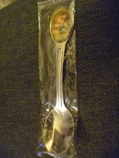 Vintage Tetley Tea folk spoon