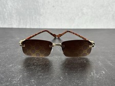 GUCCI RIMLESS SUNGLASSES