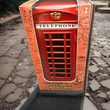 Red telephone box moneybox