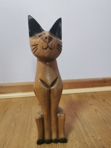 Carved wooden cat sitting - carved,
