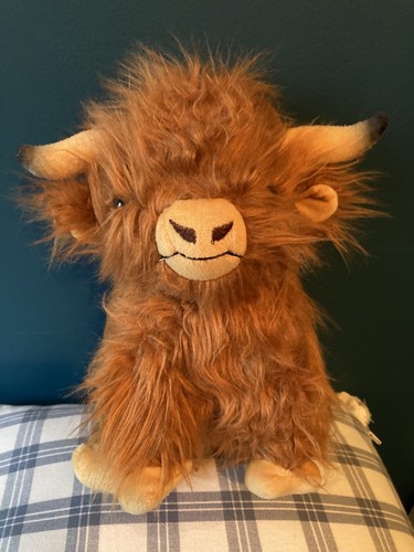 Brown highland cow cuddly - cuddly, soft