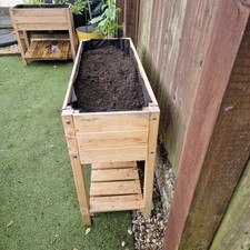 Large wooden raised garden bed with shelf ( sarah raven)