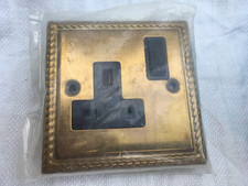 British made Brass Georgian single socket rope edged black insert switched 13A