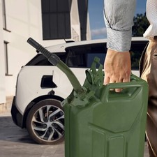 NEW METAL JERRY CAN POURING