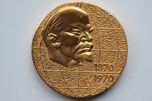 Gold tone medal - tone,