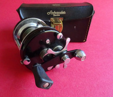 A GOOD USED CASED VINTAGE ABU AMBASSADEUR 6000C MULTIPLIER REEL