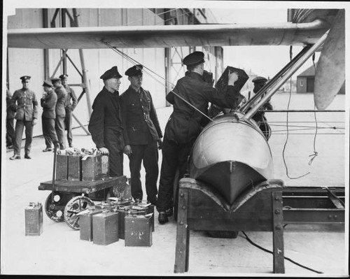 Soldiers loading petrol into - loading,
