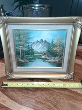 Gilt Framed  Oil Painting. Depicting Trees And House.mountains Scene