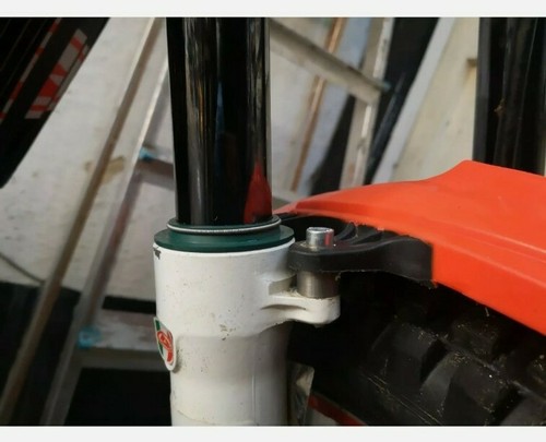 Front mudguard raisers - front,
