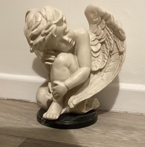 Cream statue sleeping cherub - sleeping,